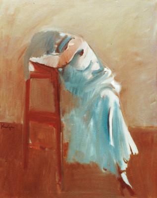 Lady seated in blue dress