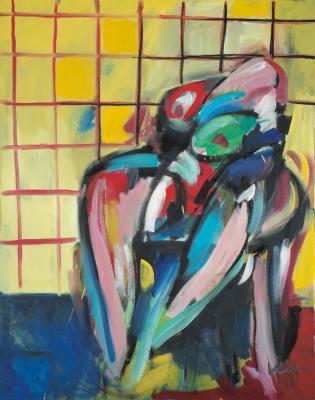 Sitzender Akt vor gelber Fliesenwand